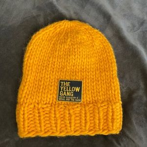 Wool and the Gang golden hand knitted wool hat